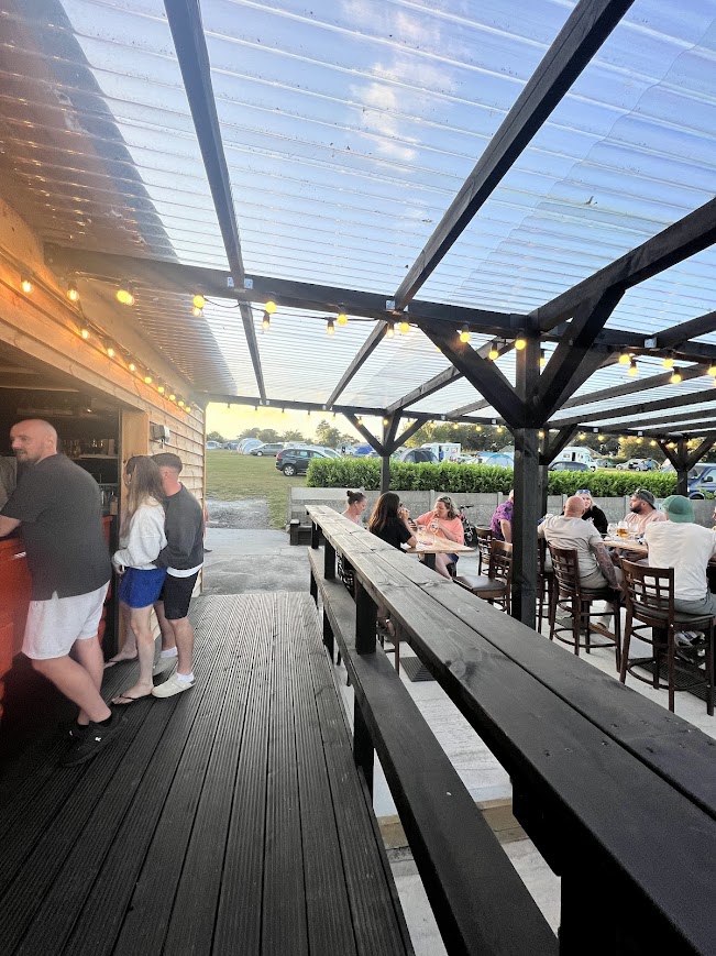 Sam's Bar is located in the centre of the camping field