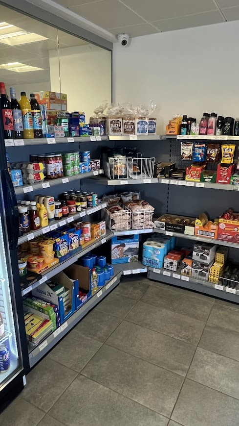 Shop at the campsite with products on the shelves.